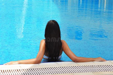 beautiful brunette woman in a swimming pool stock image image of fresh caucasian 15975169