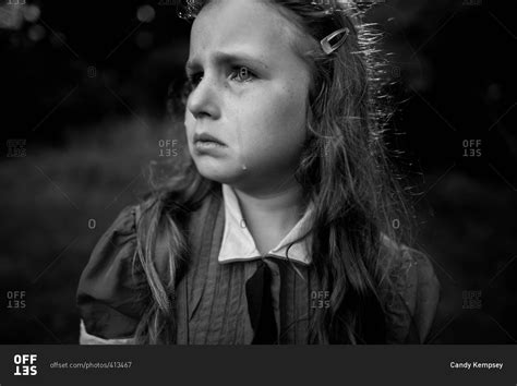 Little Girl With A Tear Falling Down Her Cheek Stock Photo Offset