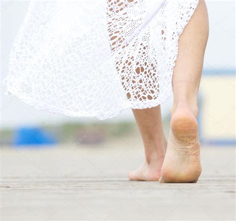 Barefoot Woman Walking Away Stock Photo Mimagephotos 45988615