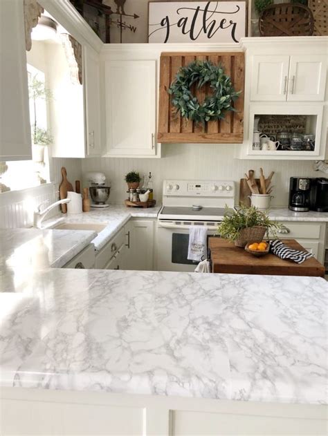 White is one of the top kitchen cupboard colors for 2021 because it pairs so well with. Easy & Inexpensive Ways To Update Your Kitchen On A Budget ...