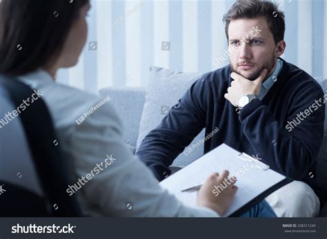 Young Man During Therapy At Psychologists Office Stock Photo 338311244