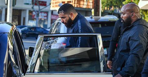 Drake Reappears With More Security Than Ever In First Pics Since Knife Wielding Trespasser