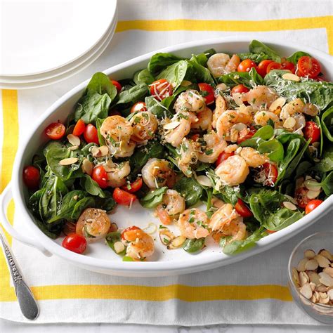 Start by marinating the raw crustaceans in a mixture of butter, olive oil, garlic, white wine, and herbs, to load them up with flavor. Shrimp Scampi Spinach Salad Recipe | Taste of Home