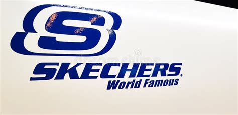 Skechers Logo And Text Sign Front Of Athletic Footwear Shop Brand From