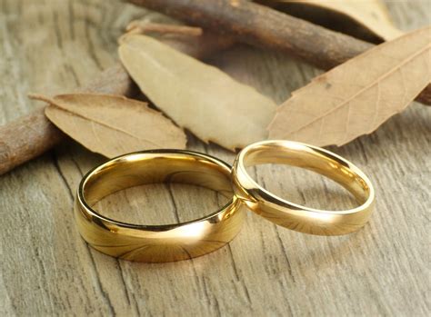 Gold on its own is too soft to be practical, so it's always mixed with other alloy metals to create. Handmade Gold Dome Plain Matching Wedding Bands, Couple ...