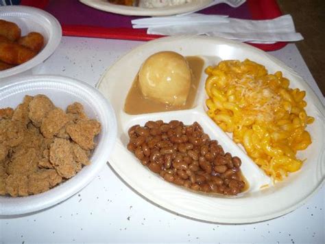Reheat mashed potatoes in a microwave safe dish. Popcorn chicken, macaroni & cheese, mashed potatoes, beans ...