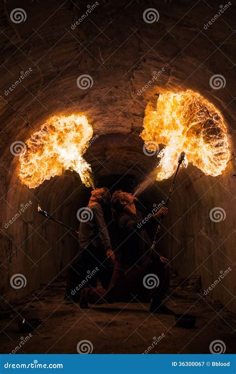 Young Man Blowing Fire From His Mouth Stock Image Image Of Fire