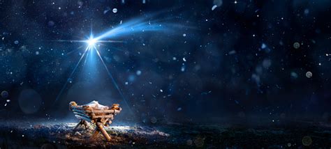 Nativity Scene Birth Of Jesus Christ With Manger In Snowy Night And