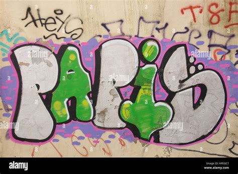 Urban Street Art Green And Silver Graffiti Letters Spray Painted On
