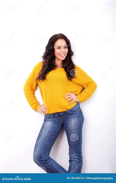 attractive woman standing with hands on hips stock image image of background cheerful 78143275