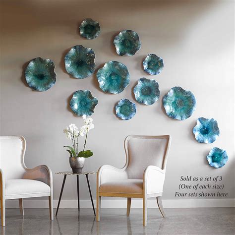 Happiness is forever in the air when you gaze at beautiful flower pictures. Abella Blue Ceramic Abstract Flower Art Set for Wall or ...