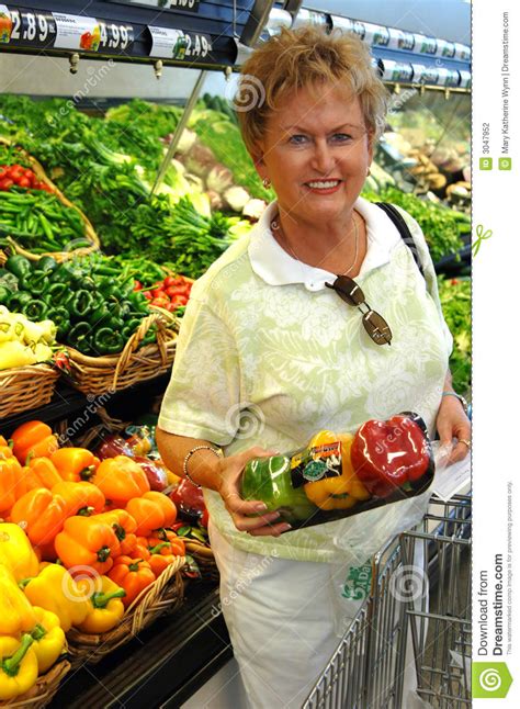 What to buy for seniors. Senior Woman Grocery Shopping Stock Photo - Image of shop ...