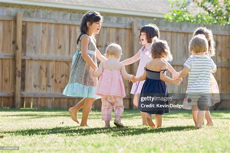 Children Playing Ring Around The Rosy High Res Stock Photo Getty Images