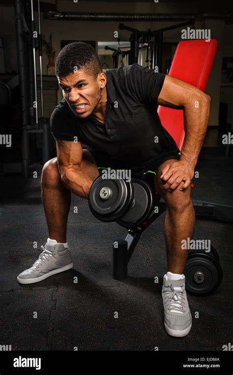 Man Doing Biceps Curl In Hi Res Stock Photography And Images Alamy