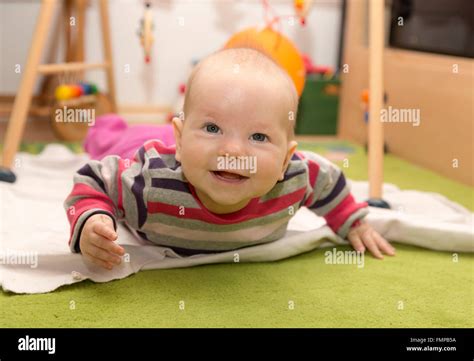 Happy Baby Lying On Stomach Hi Res Stock Photography And Images Alamy