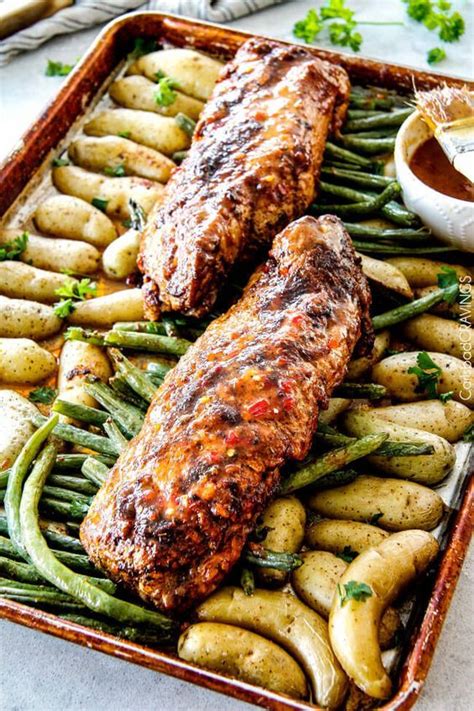 When tenderloin is done cooking, remove sheet pan and top each tenderloin with one tablespoon of garlic herb better and let pork tenderloin rest before slicing. Sheet Pan Chili Dijon Pork Tenderloin with Green Beans and ...