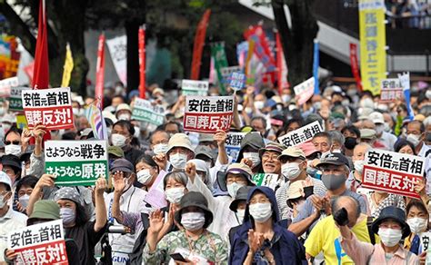 13000 People Brave Typhoon To Protest State Funeral For Abe The