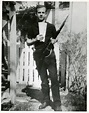 Photograph of Lee Harvey Oswald holding a rifle – Historical Objects ...
