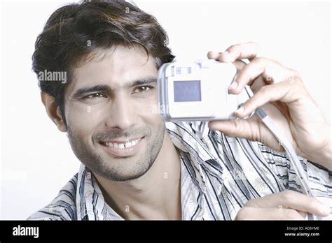 Young Man Taking A Photograph Of Himself Stock Photo Alamy