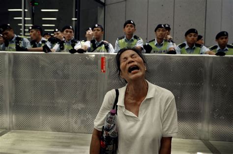 A protester in hong kong last month. China waiting out Hong Kong protests, but backlash may come