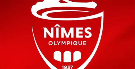 Coat of arms), from middle low german wâpen (weapon; Völlig neues Nîmes Olympique 2018 Wappen enthüllt - Nur ...