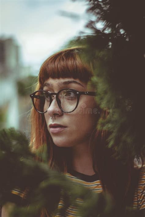 Woman With Eyeglasses And Nose Piercing Picture Image 94886964