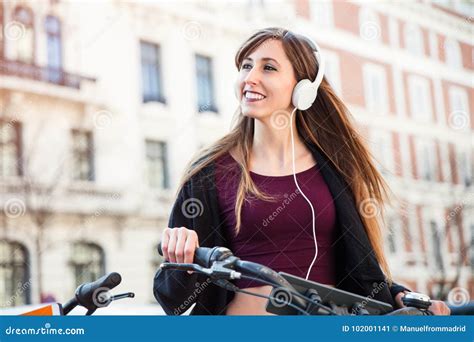 Young Woman Listening To Music In The Street Stock Image Image Of