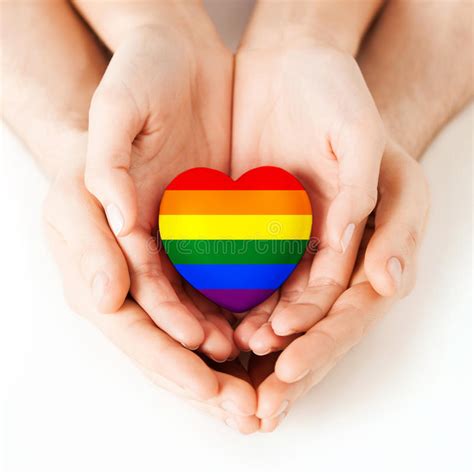 Male And Female Hands Holding Rainbow Heart Stock Image Image Of Cupped Right 58436253