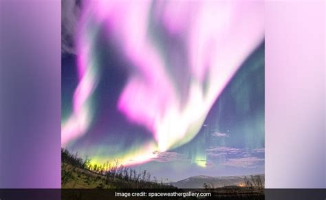 After A Solar Storm A Stunning Pink Aurora Spotted In Earths Night Skies