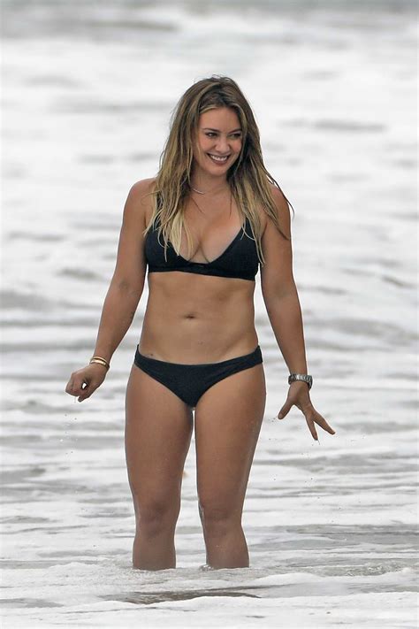 Hilary Duff In A Black Bikini Hangs Out On The Beach In Malibu California