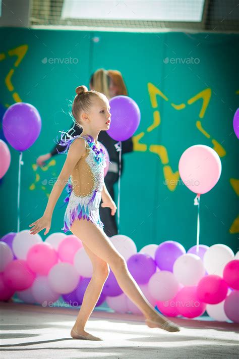 Adorable Gymnast Participates In Competitions In Rhythmic Gymnastics