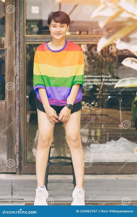 Portrait Lgbt Transgender Shemale Or Women Short Hair Happy Smile Asian Race With Rainbow Shirt