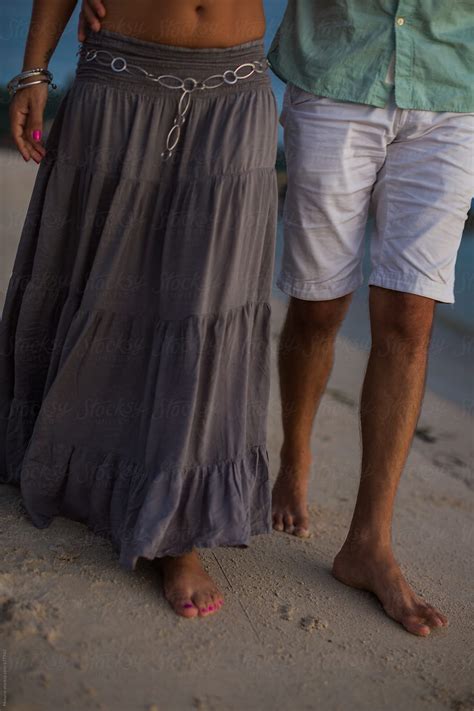 Anonymous Couple Walking At The Beach By Stocksy Contributor Mosuno