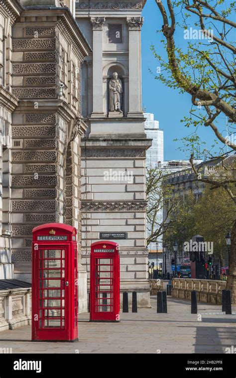 Traditional Red Telephone Kiosks On The Streets Of London England Uk