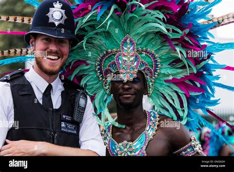 Black Man At The Notting Hill Carnival Wearing Brightly Coloured
