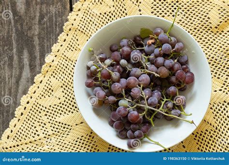 Blue Grapes Lie On The Table In A Plate Stock Photo Image Of Dessert
