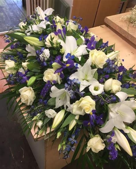 Find the perfect casket flowers stock photo. Purple, Blue & White Casket Spray - buy online or call ...