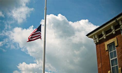 why flags are at half staff today friday january 27