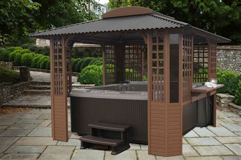 A Gazebo With Hot Tub In The Middle