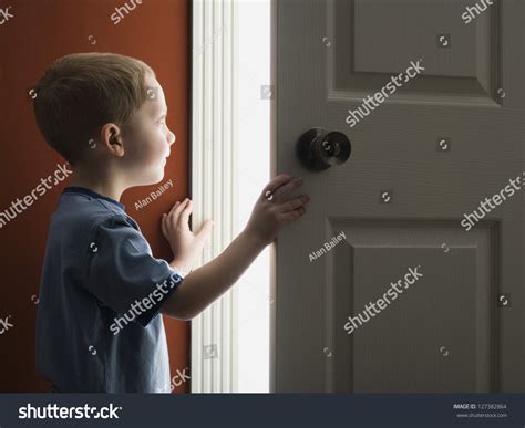 Little Boy Opening The Door At Home Stock Photo 127382864 Shutterstock
