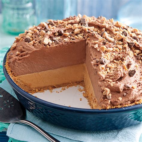 Rich lavish chocolate peanut butter pie drizzled with chocolate ganache and sprinkled with chopped nuts. Fluffy Peanut Butter Chocolate Pie - Paula Deen Magazine