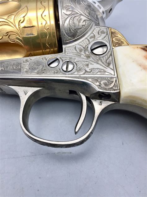 Engraved 45 Single Action Colt Revolver