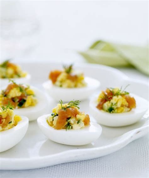 Enjoy smoked salmon with coddled eggs, capers and gruyère cheese for a christmas starter. Eggs Stuffed with Smoked Salmon and Cucumbers | Recipe ...