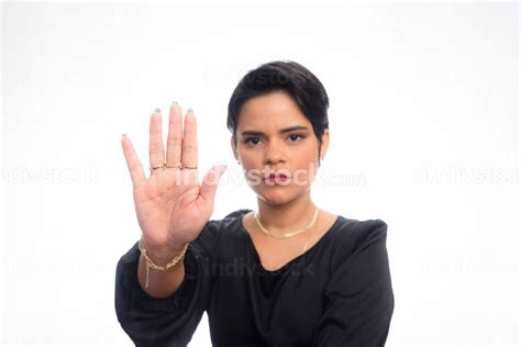 Young Elegant Business Woman Making Stop Sign With Hand Isolated On