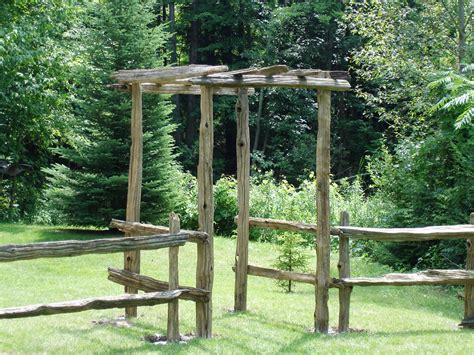 Wood split rail fences are very simple and interesting to install even on your own. old split cedar rail arbor and fence that we built at our ...