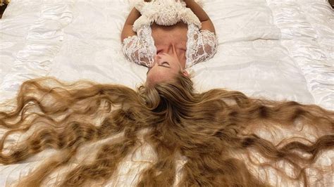 Instagram Blonde Meet The Real Life Rapunzel With Her Luscious 6 Foot Long Hair Al Bawaba