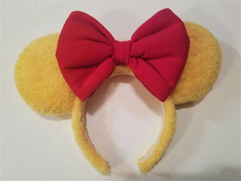Fold felt in half and use the pipe cleaner triangles as a template to cut out your felt ears. Pooh Bear Mouse Ears by MustBeMice on Etsy https://www.etsy.com/listing/460799374/pooh-bear ...