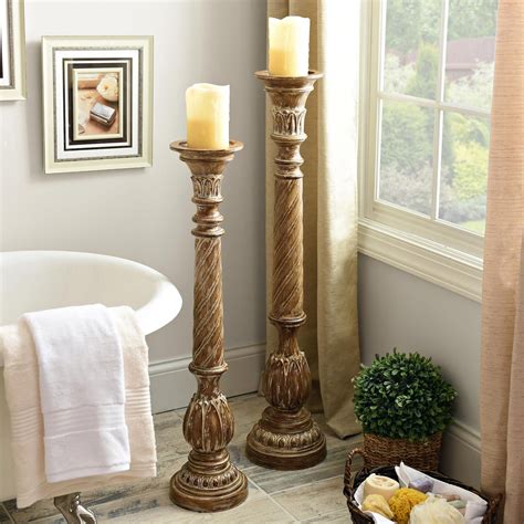Add Floor Pillar Candle Holders To Your Living Room Or To Your Bathroom
