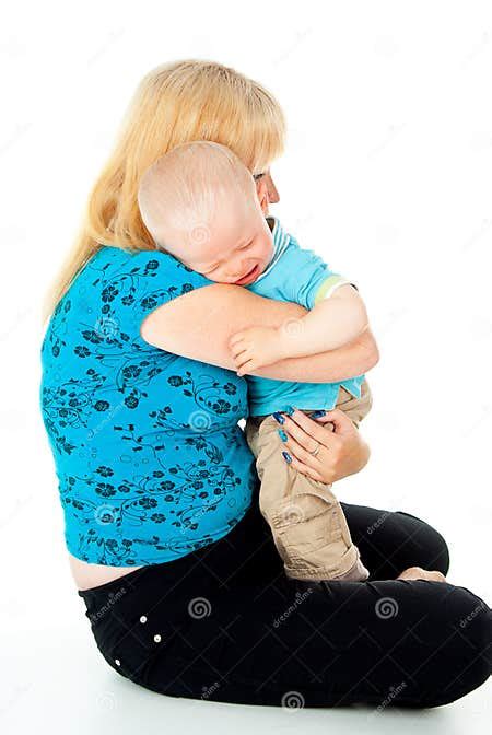 Mother Comforting A Crying Child Stock Photo Image Of Blonde