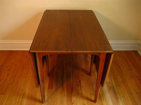 mid century drop leaf dining table Mid-century modern drop-leaf table with chairs at 1stdibs